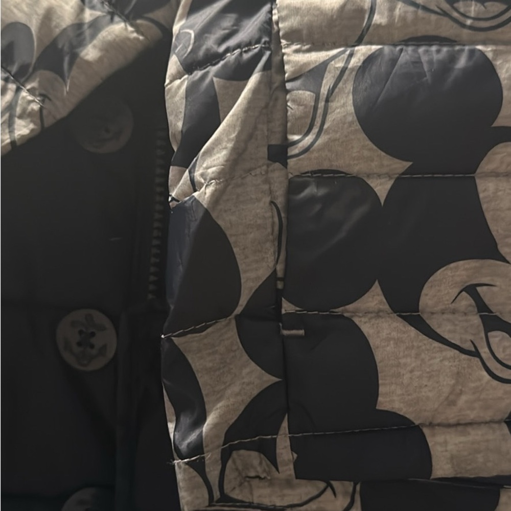 Both jackets are 12-18 months old